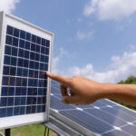 Engineer solar photovoltaic panels station checks