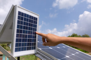 Engineer solar photovoltaic panels station checks